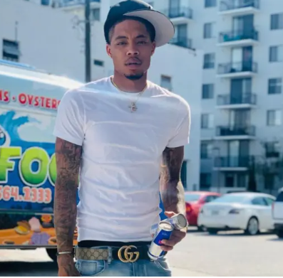 Florida rapper shot dead in front of his home minutes after daring critics to confront him