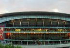 1024px Emirates Stadium east side at dusk